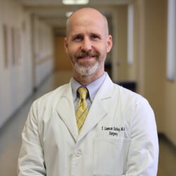 Dr. Travis Safley, MD